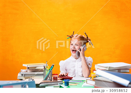 The Redhead teen girl with lot of books at home 30958652