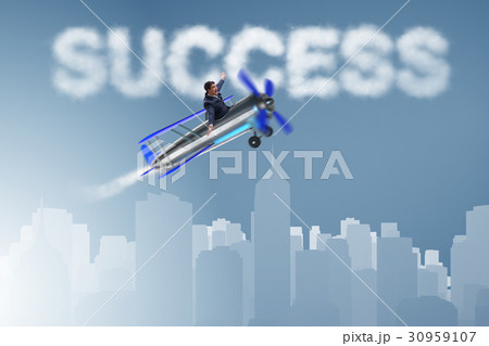 Businessman flying on airplane in success concept Businessman flying on airplane in success concept 30959107