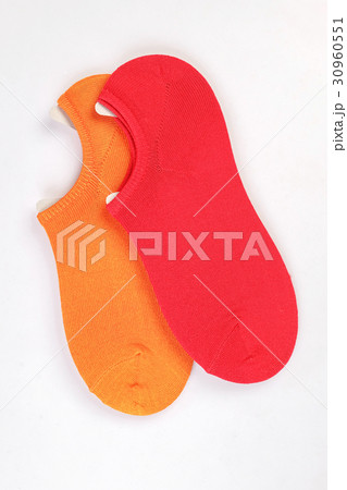 Short colorful socks on white background Short colorful socks on white background 30960551