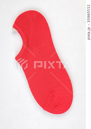 Short red sock on white background 30960552