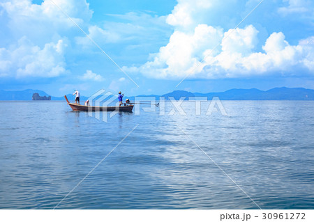 Long tail boat floating on the sea 30961272