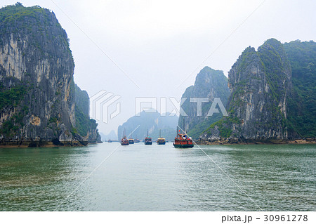 The tourist ship on foggy day, Halong Bay, Vietnam 30961278