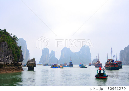 The tourist ship on foggy day, Halong Bay, Vietnam 30961279