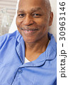 Senior African American Patient in Hospital Bed 30963146