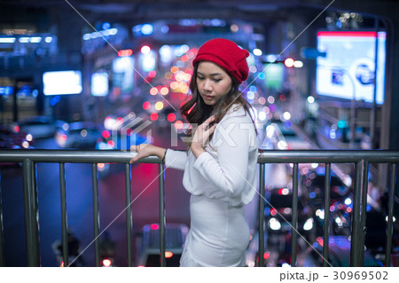 Lonely asian woman, outdoor in night Lonely asian woman, outdoor in night 30969502