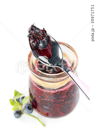 Fresh blueberry homemade jam on white background Fresh blueberry homemade jam on white background 30971751