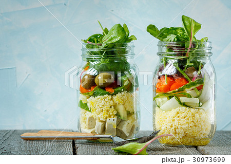 Colorful salad with couscous, tofu and vegetables  30973699