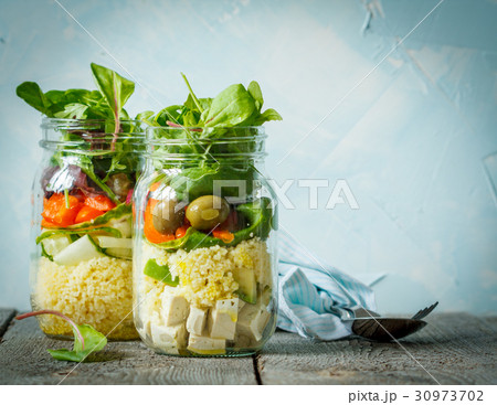 Colorful salad with couscous, tofu and vegetables Colorful salad with couscous, tofu and vegetables 30973702