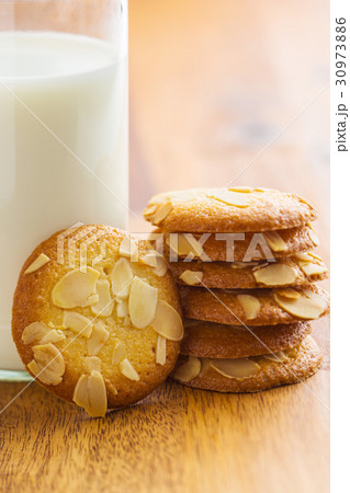 Sweet almond cookies with milk. Sweet almond cookies with milk. 30973886