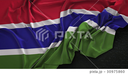 The Gambia Flag Wrinkled On Dark Background The Gambia Flag Wrinkled On Dark Background 30975860