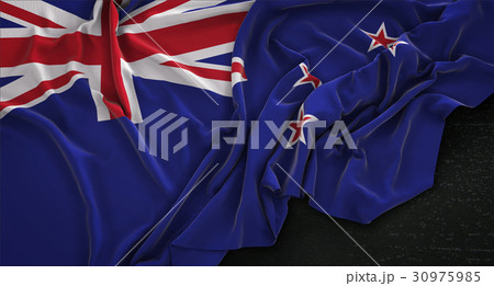 New Zealand Flag Wrinkled On Dark Background 30975985