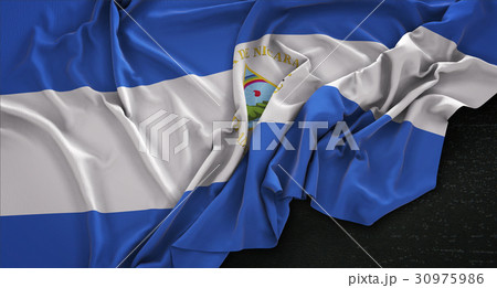 Nicaragua Flag Wrinkled On Dark Background 30975986