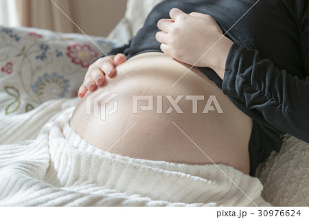 woman during pregnancy or shortly after childbirth woman during pregnancy or shortly after childbirth 30976624