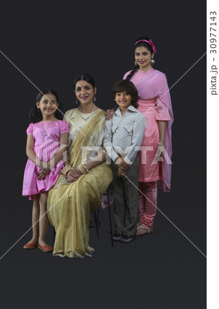 Portrait of Indian three generation family dressed in retro style 30977143
