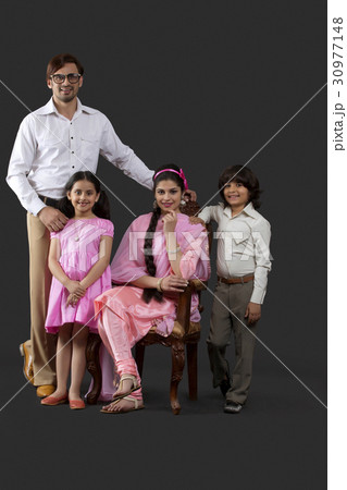 Portrait of Indian young family dressed in retro style Portrait of Indian young family dressed in retro style 30977148