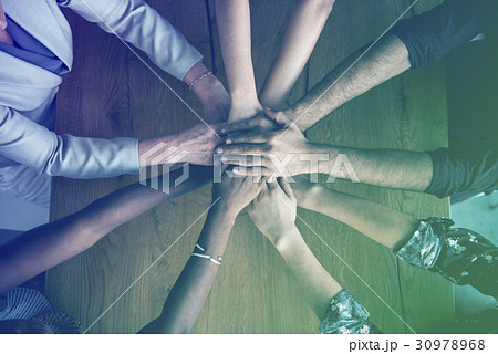 Human hands together holding together 30978968