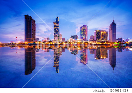 Cityscape in reflection of Saigon at twilight. 30991433