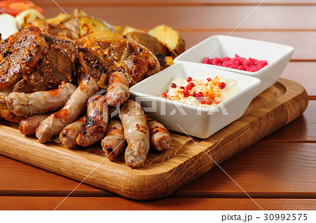Big grilled meat and vegetables board 30992575