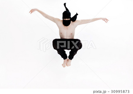 Ninja on white background. Male fighter in black 30995873