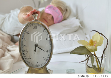 Alarm Clock and Awake Woman 31003415