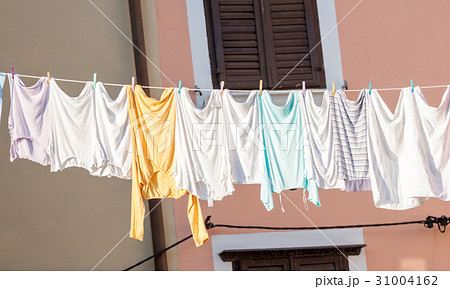 laundry drying outside in the town 31004162