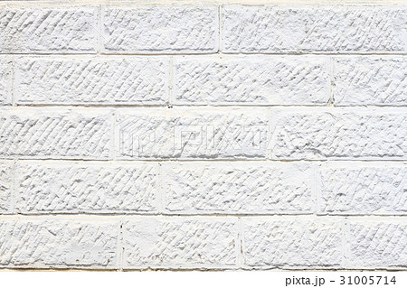 軟石の白い壁 背景素材の写真素材