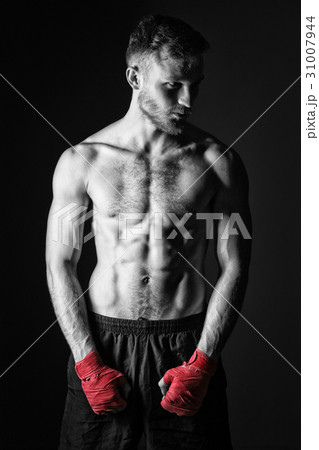 Fighter with red boxing bandages 31007944