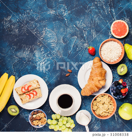 Breakfast with pancakes, fruits, nuts, coffee 31008338