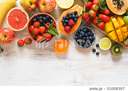 Rainbow fruits top view on white Rainbow fruits top view on white 31008367