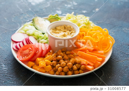 Healthy cut vegetables on the blue table 31008577
