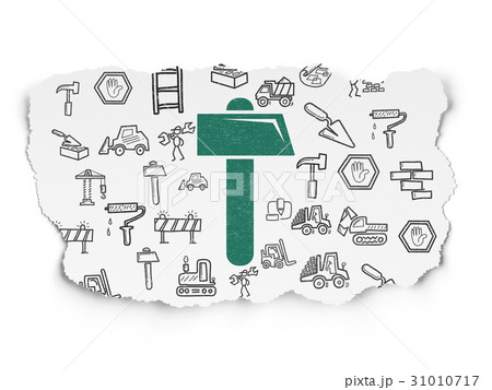 Construction concept: Hammer on Torn Paper 31010717