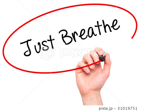 Man Hand writing Just Breathe with black marker Man Hand writing Just Breathe with black marker 31019751