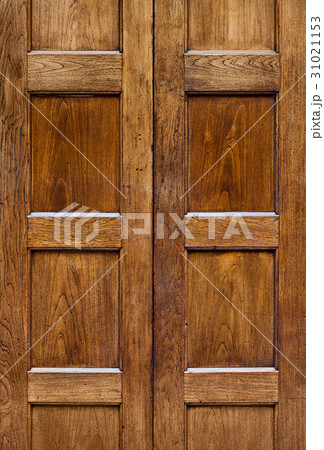 Old wooden door with square plates texture Old wooden door with square plates texture 31021153