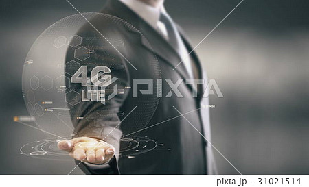 4G LTE with hologram businessman concept 4G LTE with hologram businessman concept 31021514