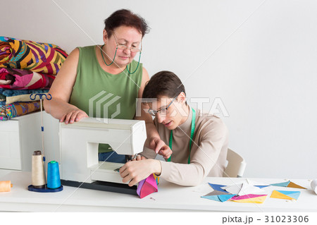 quilting and patchwork of tailor male - an elderly quilting and patchwork of tailor male - an elderly 31023306