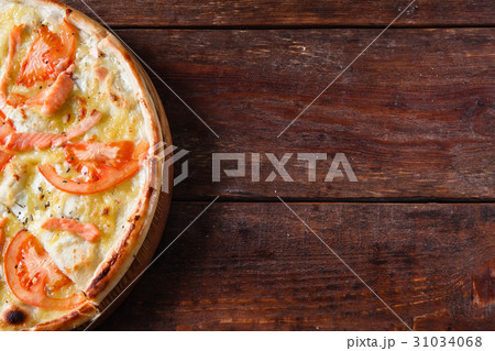 Baked pizza with tomato and salmon, flat lay 31034068