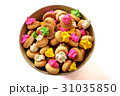 Bowl of iced gem biscuits on white background. 31035850