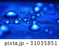 Macro: Water drops in blue hue 31035851