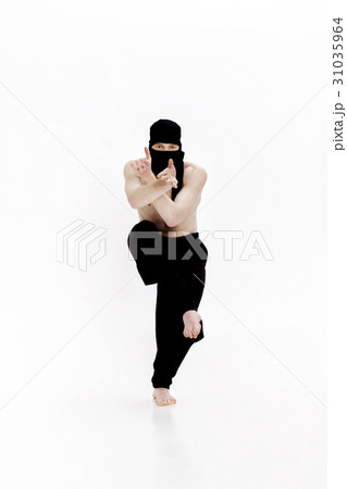 Ninja on white background. Male fighter in black 31035964