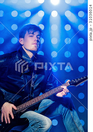 young attractive rock musician playing electric 31036014