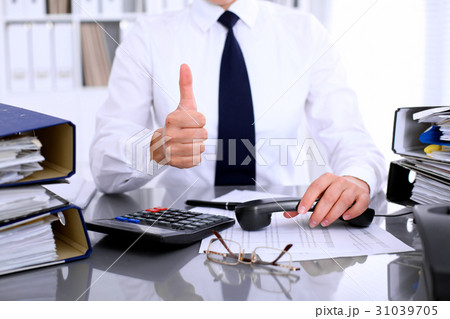Close up of business woman showing ok sign while Close up of business woman showing ok sign while 31039705
