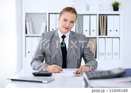 Business woman making report, calculating or 31040186