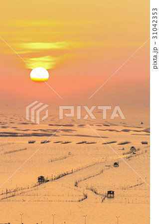 fisherman's wooden hut on sea water with sunset fisherman's wooden hut on sea water with sunset 31042353