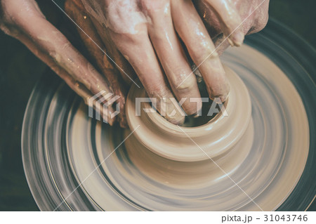 Creating vase of white clay close-up. Master crock Creating vase of white clay close-up. Master crock 31043746