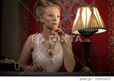 Woman in victorian dress and interior 31045017