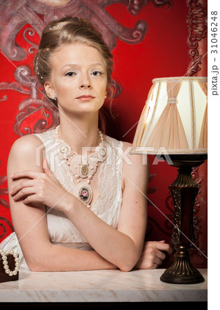 Gorgeous Woman in victorian dress and interior Gorgeous Woman in victorian dress and interior 31046248