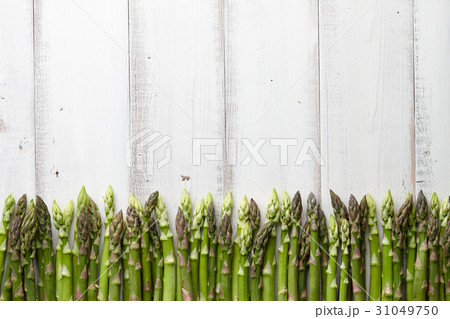 Fresh green asparagus in a row 31049750
