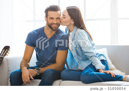 Young couple moving to a new apartment together Young couple moving to a new apartment together 31050054