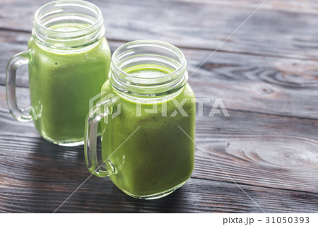 Avocado and spinach smoothies 31050393