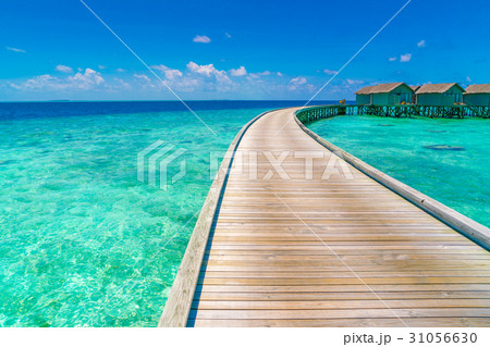 Beautiful water villas in tropical Maldives island . Beautiful water villas in tropical Maldives island . 31056630